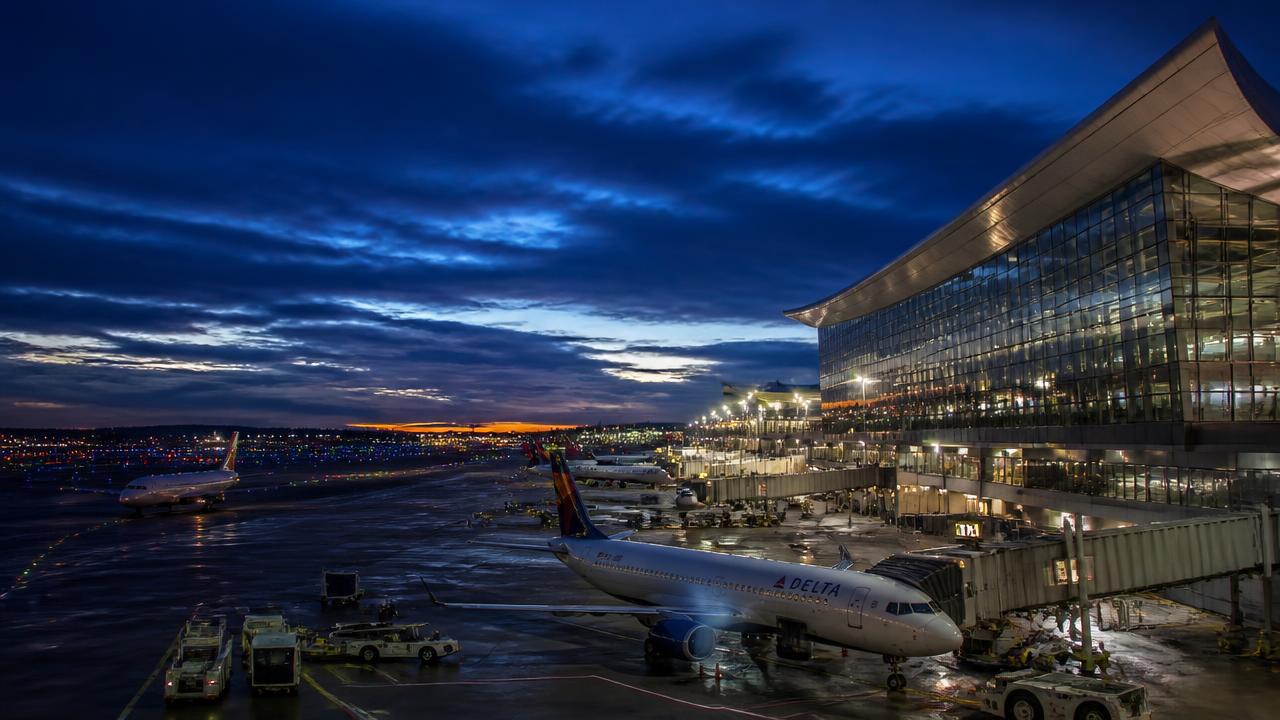 Modern U.S. airport terminal at twilight
